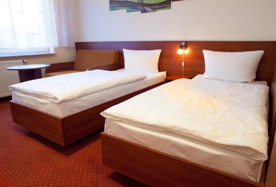 hotel - Hotel Podróżnik - Pokoje - zdjęcie 1